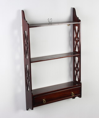A Chippendale style mahogany hanging 3 tier wall shelf, the base fitted a drawer and with pierced decoration to the sides 68cm h x 41cm w x 10cm d 