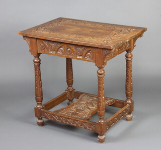 A Victorian rectangular heavily carved oak centre table with apron, raised on turned supports with rectangular undertier  73cm h x 76cm w x 52cm d 