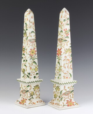 A pair of Chinese ceramic reproduction obelisks on square bases decorated with flowers 41cm 