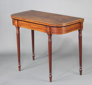 A Georgian bleached inlaid mahogany D shaped card table, raised on turned and reeded supports 73cm h x 91cm w x 45cm d 
