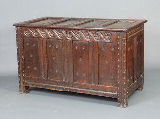 A 17th/18th Century oak coffer of panelled construction with hinged lid 78cm h x 129cm w x 68cm d 
