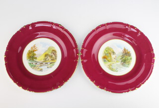 W E Deam, two Royal Crown Derby porcelain plates - Lion Rock in Dovedale  25cm