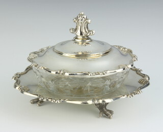 A circular cut glass and sterling silver butter dish and cover raised on 3 claw supports, 224 grams, base marked IND Peruana Plata 925 Sterling 