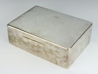 A rectangular silver cigar/trinket box with hinged lid, London 1946, lid inscribed, 7cm h x 22cm w x 15.5cm d 