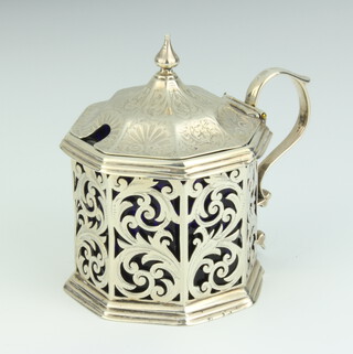 A Victorian octagonal pierced silver mustard pot with blue glass liner Birmingham 1855 90 grams 