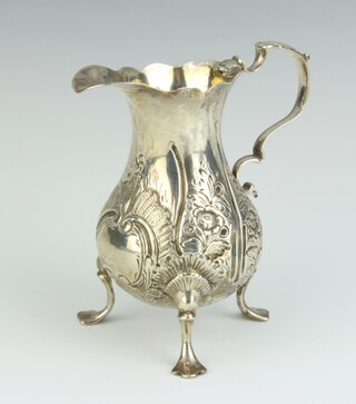 A George III embossed silver cream jug London 1762, 99 grams 