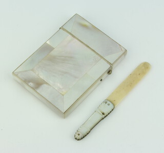 A Victorian mother of pearl card case 9cm x 7cm together with a Victorian folding pen knife/letter opener the steel blade marked G R Osborn with mother of pearl grip 11cm 