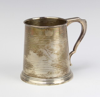 A Georgian style silver christening tankard Birmingham 1931, 127 grams 