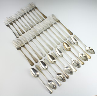 A Continental silver Old English pattern table service comprising 12 dessert spoons, 11 dessert forks and 12 dinner forks, gross 1570 grams 
