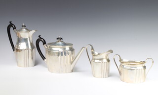 A silver 4 piece tea and coffee set with ebony mounts, London 1918, gross 1560 grams 