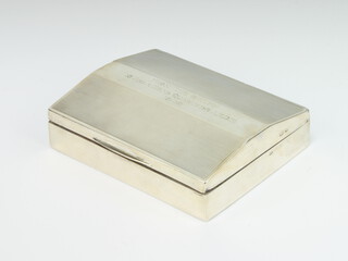 A 1930's silver engine turned cigarette box with presentation inscription Birmingham 1939, 11cm 