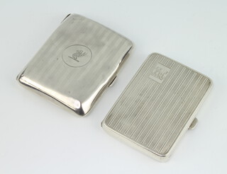 A silver engine turned cigarette case and 1 other, gross 148 grams 