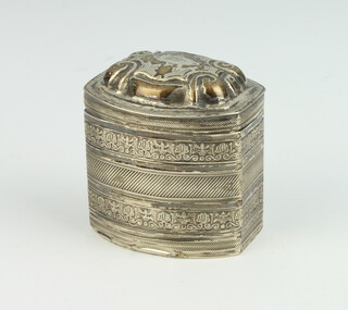 A 19th Century Continental engine turned rounded rectangular silver box with repousse decoration 