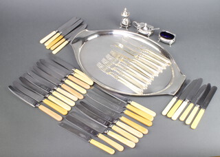 An oval silver plated tray and minor plated cutlery and condiments 