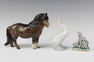 A Beswick figure of a Shetland pony 14cm, Lladro figure of a goose 11cm and a Chelsea style figure group of a Dalmatian 7cm 