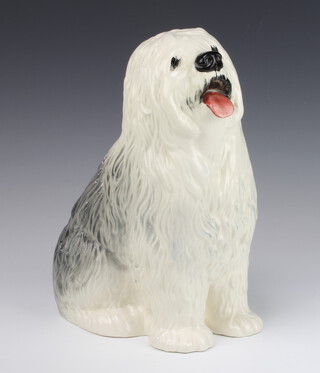 A Beswick figure of a seated Old English Sheep Dog, base with rubber stamp mark 29cm 