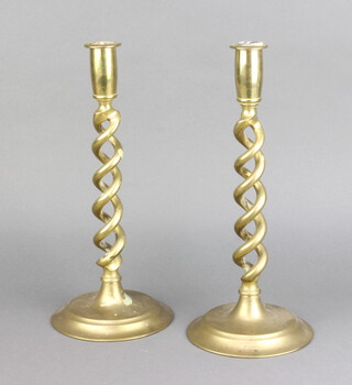 A pair of 19th Century brass spiral turned candlesticks 31cm h 