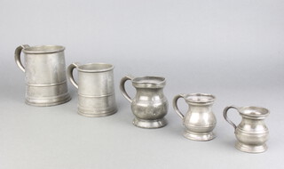 A 19th Century pint pewter tankard marked H Flint, Horsham, the interior marked John Warne together with a half pint ditto, gill pewter measure (dented) half gill measure and a 1/12th pint measure