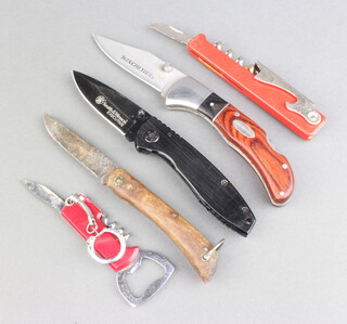 A Smiths and Wesson Executive folding knife, a Winchester folding knife with wood grain effect blade, folding pruning knife and 2 waiter's friends