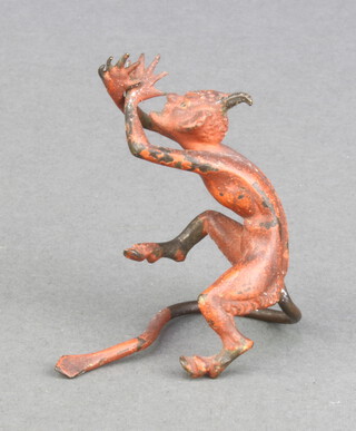 An Austrian cold painted bronze figure in the form of a seated Devil 5cm x 4cm 