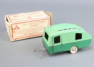 A Triang Minic caravan in green, boxed  