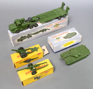 A Dinky 692 5.5 medium gun boxed (box slightly dented), together with a Dinky 693 7.2 Howitzer boxed (box flap missing), a Dinky 660 tank transporter boxed and a Dinky 651 Centurion tank boxed 