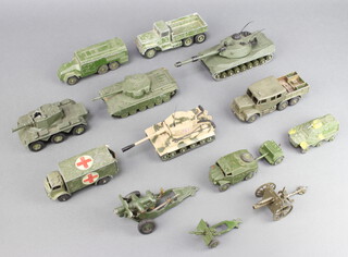A Dinky armoured command vehicle no.677, ditto field artillery tractor 688, a 651 Centurion tank and other military model vehicles 

