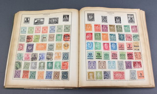 An album of GB and world stamps - Victorian and later including 2 penny reds, a YMCA Invasion Front Appeal 1944 3d stamp, a Victory stamp and other world stamps including America, South Africa, Poland, Japan, Italy, India, Hungary, Holland 
