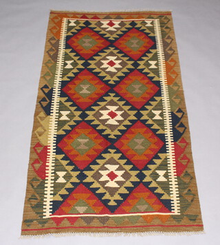 A black, brown and green ground Maimana Kilim rug 194cm x 100cm 