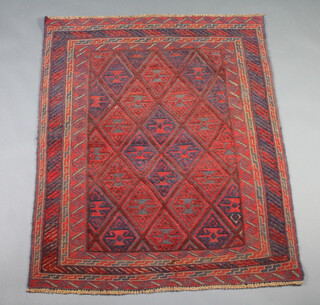 A red and blue ground Gazak rug with all-over diamond design to the centre within a multi row border 145cm x 118cm 