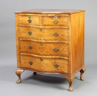 A Queen Anne style figured walnut and crossbanded chest with quarter veneered top, fitted 2 short drawers above 3 long drawers, raised on cabriole supports 91cm h x 77cm w x 50cm d 