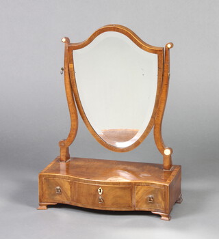 A 19th Century mahogany bevelled plate shield shaped dressing table mirror contained in a mahogany swing frame, the base of serpentine outline fitted 3 drawers, raised on ogee bracket feet 51cm h x 37cm w x 19cm d  