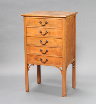 An Edwardian bleached mahogany music chest of 5 drawers with swan neck drop handles 87cm h x 51cm w x 38cm d 