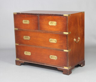 A 20th Century mahogany and brass mounted military chest of 2 short and 2 long drawers with brass drop handles to the side and brass countersunk handles, raised on bracket feet 76cm h x 86cm w x 45cm d 
