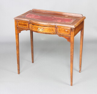 An Edwardian inlaid mahogany bow front writing top with raised top, inlaid leather writing surface, fitted a frieze drawer and raised on square tapered supports 76cm h x 76cm w x 43cm d 