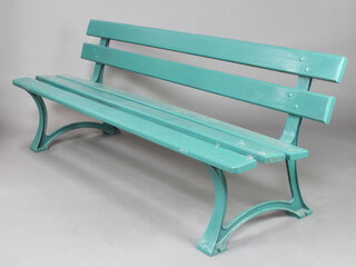 Mobilur, a green painted iron and wooden slatted garden bench 76cm h x 200cm w x 69cm d 
