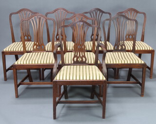 A set of 8 Hepplewhite style mahogany camel back dining chairs - 1 carver, 7 standard with upholstered drop in seats, raised on square supports with H framed stretchers 