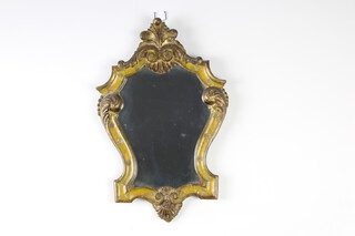 An Italian Rococo style shield shaped mirror contained in a gilt painted frame 39cm h x 25cm w 