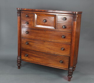 A Victorian Scots baronial/cumberland chest fitted 1 long and 4 short drawers above 3 long drawers with tor handles and columns to the side, 136cm w x 131cm w x 58cm d 
