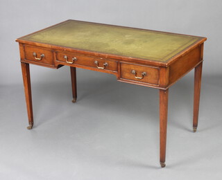 A 19th Century mahogany writing table with green inset tooled leather writing surface above 1 long and 2 short drawers, raised on square tapered supports, brass caps and casters 76cm h x 122cm w x 67cm d 