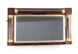 A 19th Century rectangular plate over mantel mirror contained in a rosewood frame with column decoration 40cm h x 70cm 