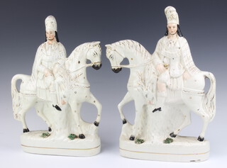 A pair of 19th Century Staffordshire flat back figures of "cavalrymen" 36cm 