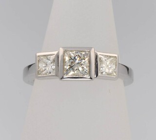 An 18ct white gold 3 stone princess cut diamond ring size M 1/2, 1.6ct 
