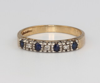 A 9ct yellow gold sapphire and diamond ring size R 1/2