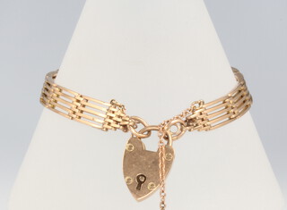 A 9ct yellow gold gateleg bracelet and heart padlock, 15 grams 
