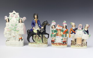 A Staffordshire flat back figure group of 2 ladies supporting a clock 33cm (some crazing), ditto Dick Turpin (head f and r) 30cm, ditto of 2 gentleman beneath a clock surmounted by a greyhound 12cm (greyhound head f and r), ditto of 2 ladies supporting a clock 23cm (f and r)  