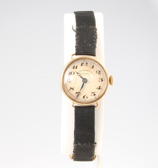 A lady's 9ct yellow gold wristwatch on a silk strap 