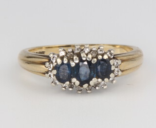 A 9ct yellow gold sapphire and diamond cluster ring, size O