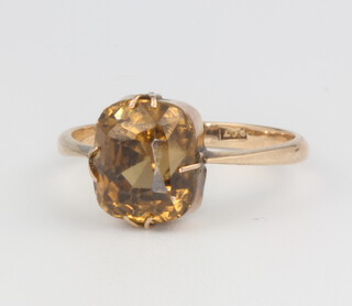A 9ct yellow gold smoky quartz ring size I