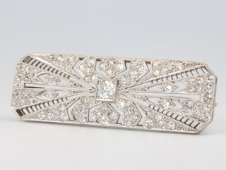 An Art Deco white gold diamond set octagonal brooch 55cmm x 16cmm, 12 grams 